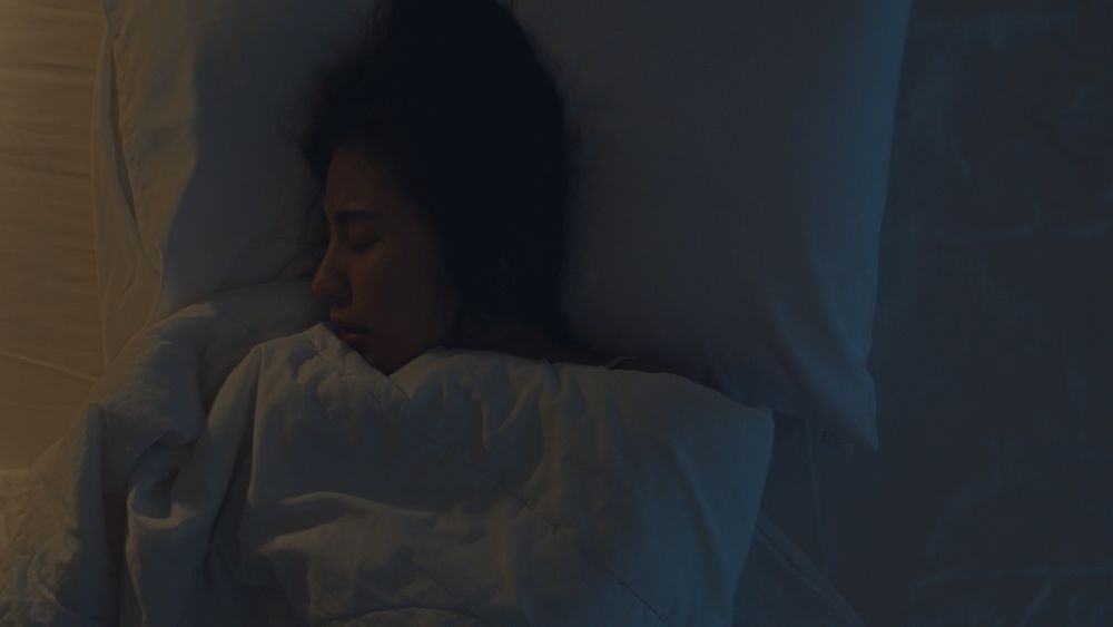Education 4 nervous young asian woman having nightmare lying bed her bedroom home middle night suffering from headache migraine insomnia sleep apnea stress top view shot small